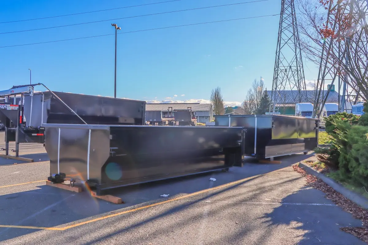 Roll-off dumpster ready for waste disposal at job site for Demolition Dumpster Rental in Williamson
